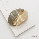 An infinity symbol that's both elegant and cute shines in your hair. Round ribbon twisted metal hair clip.