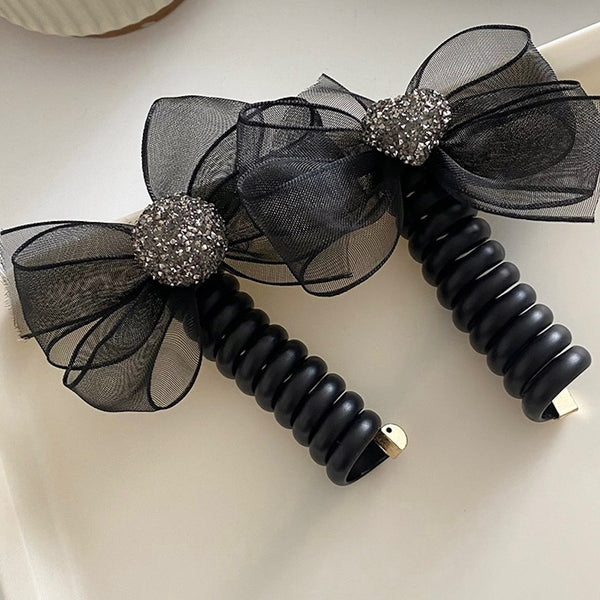 "Light Black" Coiled up ponytail with ribbon