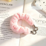 "Add a soft pop of color to your daily essentials" Fluffy smartphone wrist strap with holder sheet