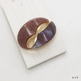 An infinity symbol that's both elegant and cute shines in your hair. Round ribbon twisted metal hair clip.