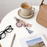 上品な輝きのポータブルミラー付き！パールとリボンのマルチストラップチャーム