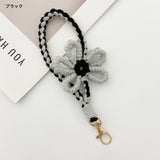 Heart-fluttering, hand-knitted flowers. Macaron-colored floral motif smartphone strap | Adorably chic rose gold shimmer [6 colors total]