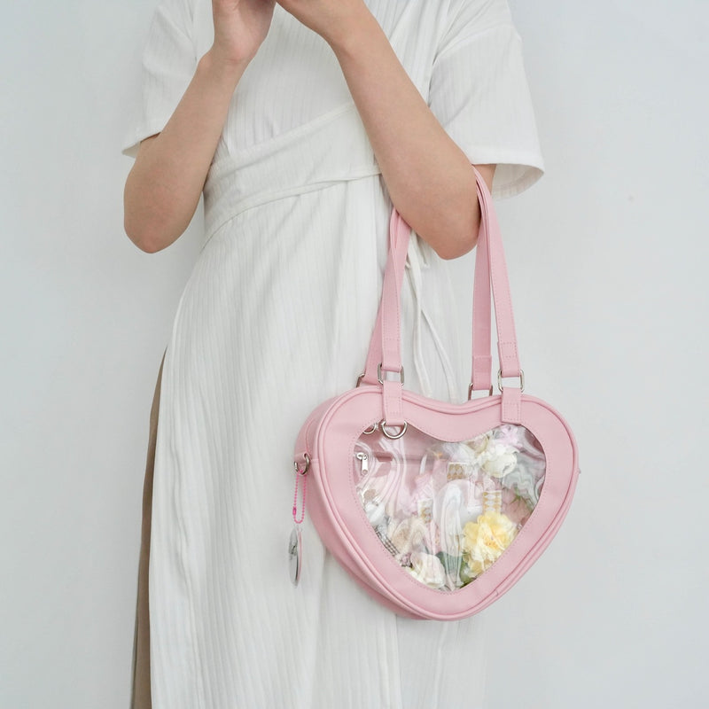 Peek into the Heart Heart bag with clear window for your favorite character