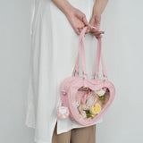 "Peek into the Heart" Heart bag with clear window for your favorite character