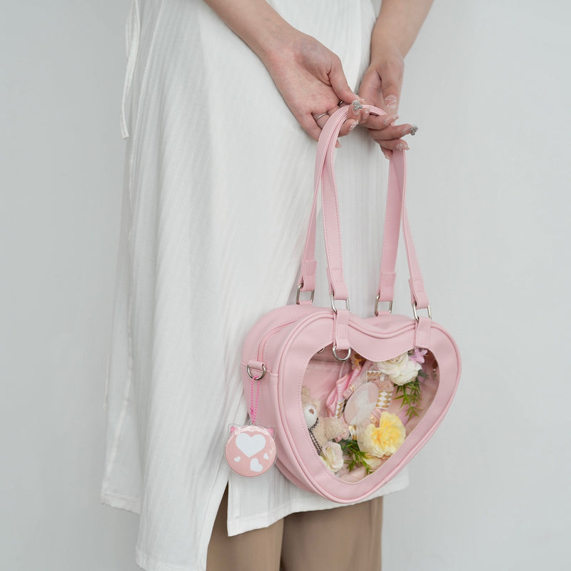 "Peek into the Heart" Heart bag with clear window for your favorite character