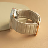 "Waterproof and magnetic" light-colored silicone band 