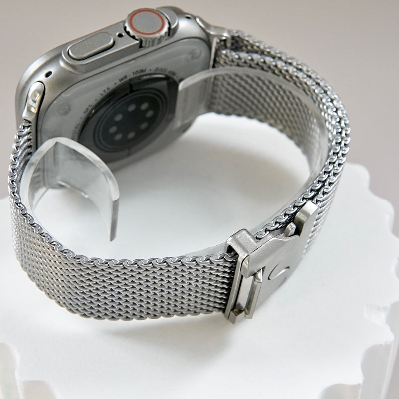 "Lightweight and comfortable fit" Natural titanium loop with snap-on mechanism