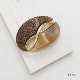 An infinity symbol that's both elegant and cute shines in your hair. Round ribbon twisted metal hair clip.