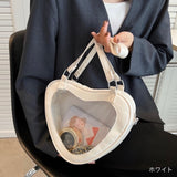 "Peek into the Heart" Heart bag with clear window for your favorite character