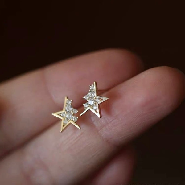 "Star alignment" cut star earrings