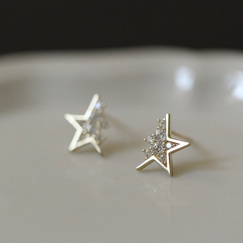 "Star alignment" cut star earrings