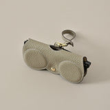 "At a glance" glasses case with strap