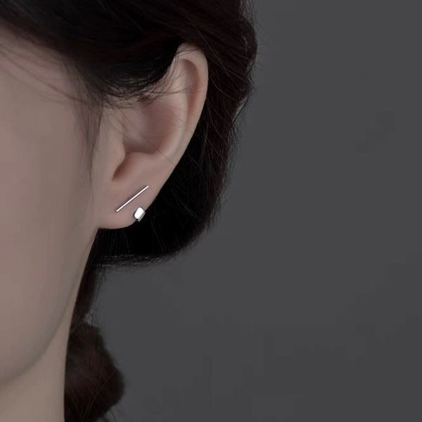 "Belt and line" ear cuff style earrings