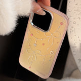 An impact-resistant, adorably chic iPhone case with a shimmering pink laser and ribbon sparkling like the aurora.