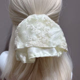 "A touch of lace for your silhouette" Embroidered lace ponytail clip