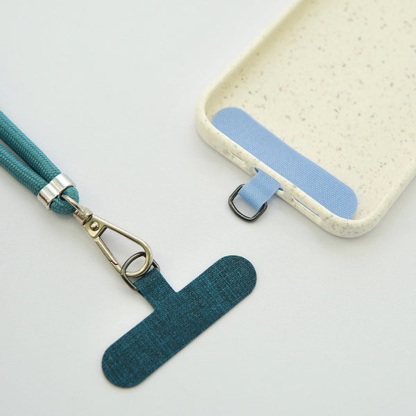 "Holds in the gap" smartphone strap holder