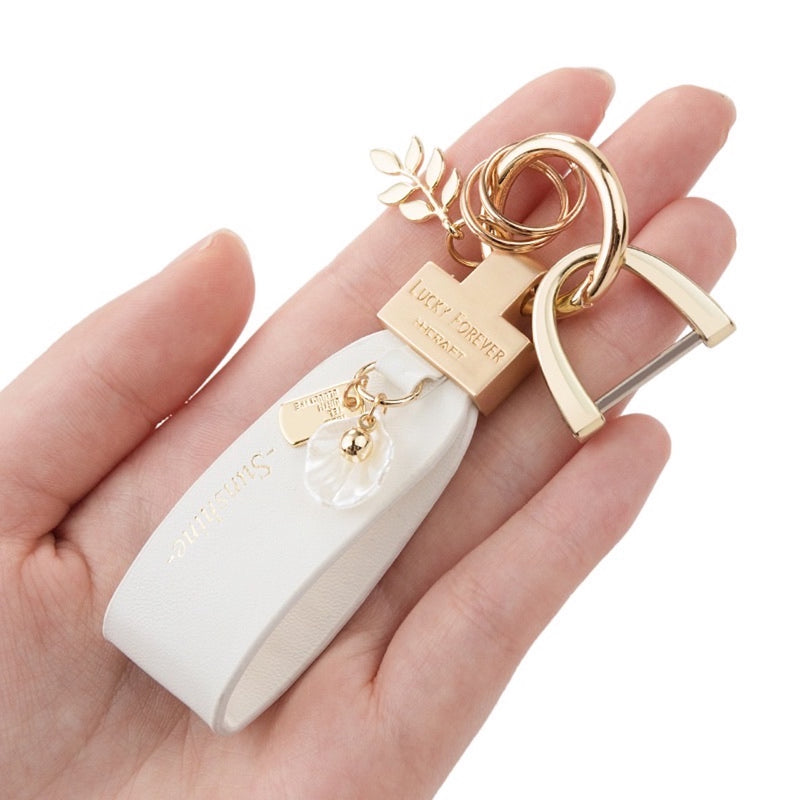 "Look for the petals" PU leather key chain