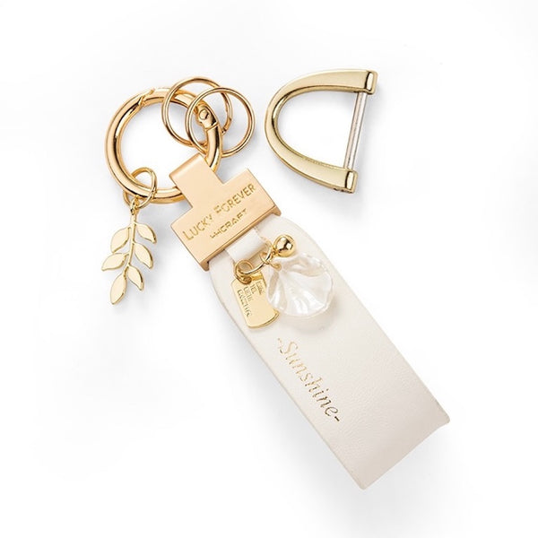 "Look for the petals" PU leather key chain