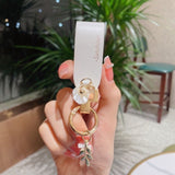 "Look for the petals" PU leather key chain