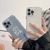 "What color should I layer it with?" Clear smartphone case with English letter pattern